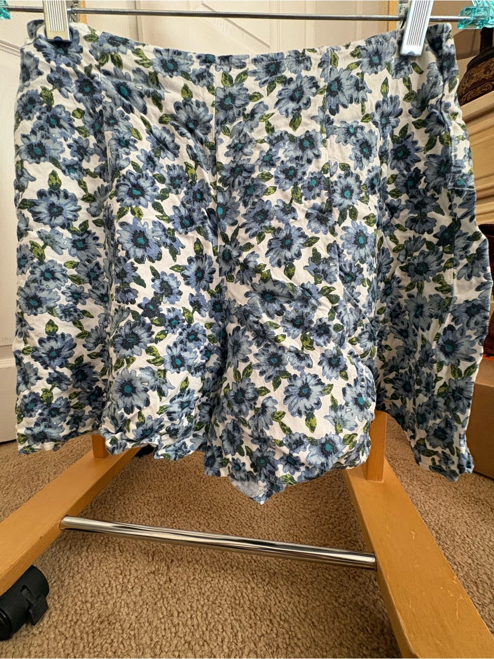 Blue and white floral shorts.  Kimchi Blue size 2.  Back zipper closure.